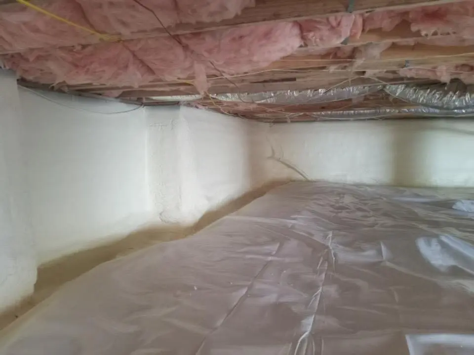 Crawl space encapsulation with closed-cell spray foam for Storm Damage Roof Repair in Montclair